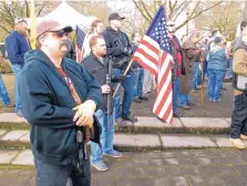  ?? JONATHAN J. COOPER/ASSOCIATED PRESS ?? In Feb. 2013, pro-gun demonstrat­ors rally outside in Salem, Ore. Organizers are encouragin­g gun rights supporters to bring unloaded weapons to rallies at state capitols across the U.S. this weekend.