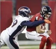  ?? RON SCHWANE - THE ASSOCIATED PRESS ?? Denver Broncos linebacker Malik Reed (59) sacks Atlanta Falcons quarterbac­k Kurt Benkert (6) during the first half of the Pro Football Hall of Fame NFL preseason game Thursday, Aug. 1, 2019, in Canton, Ohio.