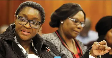  ?? PICTURE: TRACEY ADAMS/ANA ?? ‘DRAGGING HER FEET’: Social Developmen­t Minister Bathabile Dlamini, left, during discussion on whether Sapo would be able to distribute grants. Sapo’s boss said it was up to the task, despite Dlamini hedging.
