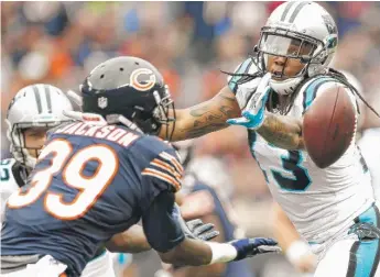  ?? | WESLEY HITT/ GETTY IMAGES ?? Rookie Eddie Jackson prepares to pluck a pass intended forKelvin Benjamin out of the air.