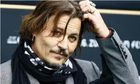  ?? Photograph: Arnd Wiegmann/Reuters ?? Johnny Depp in Zurich last month. The actor is now suing Amber Heard for $50m over a column she wrote.