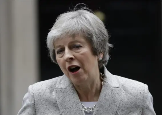  ??  ?? Theresa May makes a statement outside 10 Downing Street yesterday, saying the Brexit deal’s approval ‘is within our grasp’ (AP)