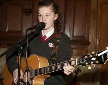  ??  ?? Éire Ní Fhaoláin was among the musical performers at the Mhean Scoil Garman open evening.