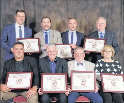  ?? SUBMITTED PHOTO ?? The seven new members inducted into the Hockey Newfoundla­nd and Labrador Hall of Fame Saturday night, or their representa­tives, are (from left) first row: Dan Cormier, Art Barry (representi­ng Kevin Morrison), Cec Thomas, Bonnie Evans; second row: Ryane...