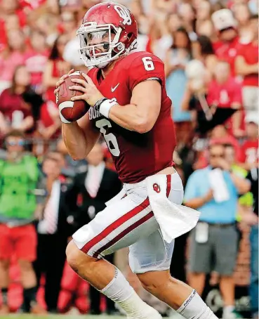  ?? [PHOTO BY STEVE SISNEY, THE OKLAHOMAN] ?? Baker Mayfield looks to pass against Tulane.