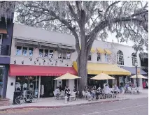  ?? JIM BYERS ?? Downtown Winter Park is filled with lovely boutique shops and lively restaurant­s with sidewalk patios.