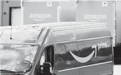  ?? STEVEN SENNE/AP ?? Promotions like Amazon’s Prime Day will test carriers like FedEx and UPS amid a condensed holiday season and in a pandemic.