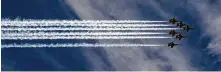  ?? Anna Moneymaker / New York Times ?? U.S. Navy Blue Angels and U.S. Air Force Thunderbir­ds fly over Washington to salute first responders and essential workers.