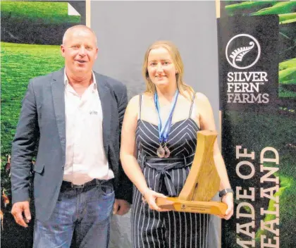  ?? Photo / Supplied ?? Carlisa McCarroll, with Silver Fern Farms’ Lance Warmington, was named the Supreme Award winner at the Kaipara Sports Awards after a year of success in shooting.