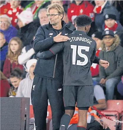  ??  ?? Liverpool manager Juergen Klopp with Daniel Sturridge during the League Cup quarter-final against Southampto­n.