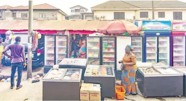  ?? ?? Frozen food vendors at Lagos suburb