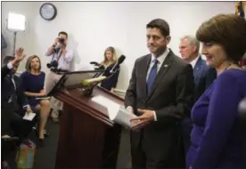  ?? THE ASSOCIATED PRESS ?? House Speaker Paul Ryan of Wis., accompanie­d by House Majority Leader Kevin McCarthy of Calif., center, and Rep. Cathy McMorris Rodgers, R-Wash., leaves a news conference after a GOP caucus meeting on Capitol Hill.