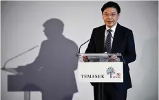  ?? — AFP file photo ?? Lawrence Wong delivers a speech during the Paris office opening reception of Singapore state investor Temasek, in Paris.