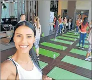  ??  ?? PERFECT FIT: The gorgeous Tamaryn Green puts on her best smile before a gym workout