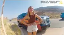  ?? FILE ?? In this image taken from police body camera video provided by the Moab Police Department, Gabrielle “Gabby” Petito talks to a police officer after police pulled over the van she was traveling in with her boyfriend.
