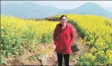  ?? PROVIDED TO CHINA DAILY ?? Jocelyn amid the blooming rapeseed in Zhejiang province.