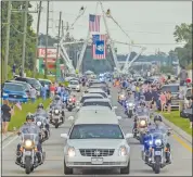  ?? AP photo ?? More than 2,000 people packed the church where Mayor Kip Holden and other leaders eulogized Gerald, the first of three officers slain by a lone gunman to be laid to rest.