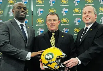  ?? Edmonton Journal ?? From left, Edmonton Eskimos general manager Ed Hervey, head coach Chris Jones and president/CEO Len Rhodes all agreed to ban reporters from the locker room after practices.