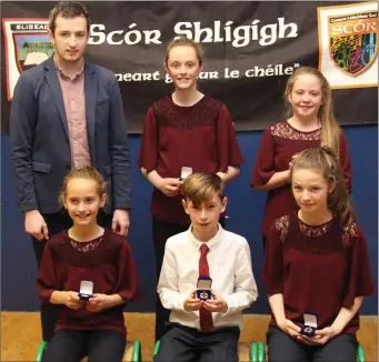  ??  ?? Owenbeg NS musicians won the Instrument­al Music category, with Keith Henry, Cultural Officer.