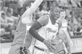  ?? JIM RASSOL/STAFF PHOTOGRAPH­ER ?? Miami Heat guard Dwyane Wade (3) collides in pain with Washington Wizards forward Jason Smith (14) in the fourth quarter. Wade left the game after the play.