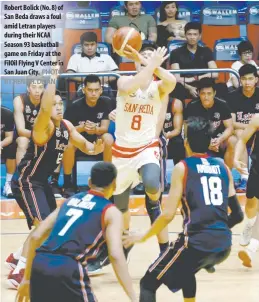  ??  ?? Robert Bolick (No. 8) of San Beda draws a foul amid Letran players during their NCAA Season 93 basketball game on Friday at the FilOil Flying V Center in San Juan City. PHOTO BY RENE H. DILAN