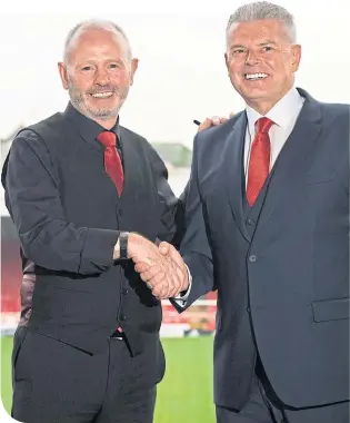  ??  ?? Stewart Milne with new Aberdeen chairman, Dave Cormack