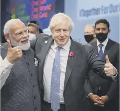  ?? ?? Boris Johnson and India’s Prime Minister Narendra Modi