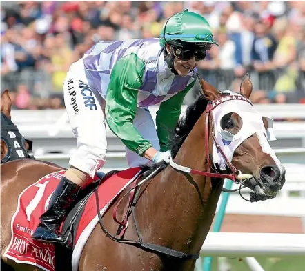  ?? GETTY IMAGES ?? Michelle Payne became the first female jockey to win the Melbourne Cup when she scored on outsider Prince Of Penzance in 2015.