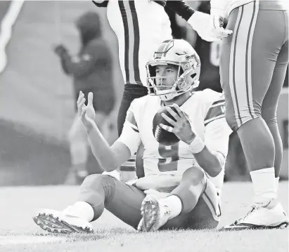  ?? MIKE DINOVO/USA TODAY SPORTS ?? Lions quarterbac­k Matthew Stafford reacts after being sacked by the Bears during the first quarter on Nov. 11.