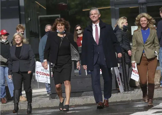  ?? NIcolaus cZarnecKI / Herald staFF ?? ‘FIGHT AGAINST ANY EFFORTS’: From left, Republican challenger­s Julie Hall, Caroline Colarusso, Kevin O'Connor and Helen Brady leave an event on Saturday supporting Supreme Court nominee Amy Coney Barrett.