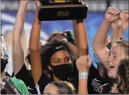  ?? MEDIANEWS GROUP PHOTO ?? Game-winning goal scorer Leah Malone raises the trophy after Pennridge won the PIAA 4A championsh­ip on Nov. 21 in Hershey.