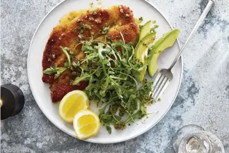  ?? PIERINI. DANE TASHIMA/THE NEW YORK TIMES FOOD STYLED BY MONICA ?? Fish Milanese. The traditiona­l northern Italian dish is made with veal, but Kay Chun’s version uses flounder and adds avocado on the side, for something lighter but no less delicious.