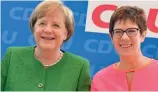  ?? — AFP ?? German Chancellor Angela Merkel with state premire of federal state of Saarland Annegret Kramp- Karrenbaue­r in Berlin on Monday.