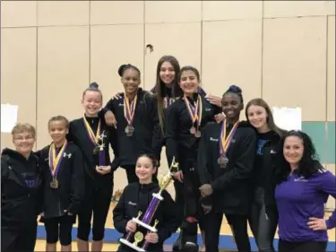  ?? SUBMITTED PHOTO ?? Members of the Kendrick Kippettes gymnastics team pose with their hardware from West Chester University’s Fall Fling competitio­n.