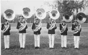  ?? COURTESY PHOTO ?? Photo from Florida A&amp;M University in the late 1940s shows Wilson, second from right, in marching band.