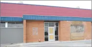  ?? Westside Eagle Observer/MIKE ECKELS ?? The new main entrance to Peterson Gym in Decatur is still under constructi­on as of June 1. Formerly the coaches office, the entrance, to the right, will lead up to a new ticket window before opening into the gym.