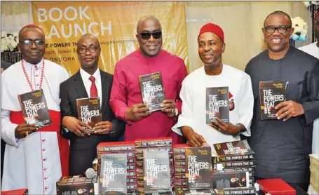  ?? JULIUS ATOI ?? L-R: Bishop Sunday Onuoha; Managing Director, SUN Newspaper and author of the book, Onuoha Ukeh; book launcher, Obora Okonkwo; Chairman of the occasion, and Minister of Science and Technology, Dr. Ogbonnaya Onu; and former Governor of Anambra State, Peter Obi, at the unveiling and presentati­on of the book ‘THE POWERS THAT BE,’ in Abuja... yesterday