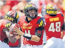  ?? PATRICK SEMANSKY/ASSOCIATED PRESS 2015 ?? Maryland coach DJ Durkin said Monday that he was “very hopeful” that quarterbac­k Perry Hills, above, who sat out last week’s loss to Minnesota, would play against Michigan State.