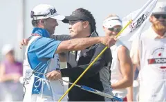  ?? AFP ?? Ariya Jutanugarn celebrates with Les Luark after winning the Yokohama Tire Classic.