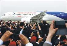  ?? FANG ZHE / XINHUA ?? The C919 makes its maiden flight from Shanghai in May.