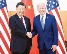  ?? US US President Joe Biden in Bali on Mon- ?? Chinese President Xi Jinping (left) met day. – Picture: Xinhua