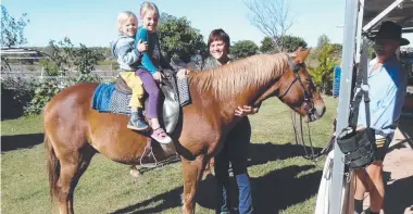  ?? SAD ENDING: The Robinson family of Charters Towers with their gelding Jessie – the family has been devastated after Jessie died while being left in the care of a Townsville veterinary clinic. ??