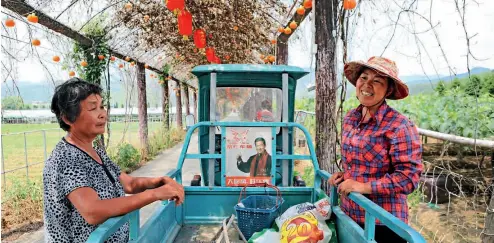  ??  ?? 26 de mayo de 2018. Wu Xiufeng y su madre, Huang Changji.