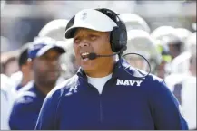  ?? AP file photo ?? Ken Niumatalol­o is the winningest coach in Navy history, going 109-83 in 15 seasons before being fired after the 2022 game against Army.
