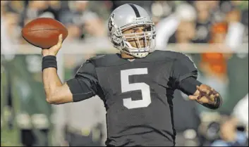  ?? Marcio Jose Sanchez The Associated Press ?? Former Raiders quarterbac­k Bruce Gradkowski, shown in 2010, says, “If you’re all in” playing quarterbac­k for Jon Gruden “you’re going to end up a better player.”