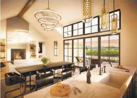  ??  ?? Top left: The homes will feature a pair of master bedrooms. Bottom left: This rendering of a great room shows off the contempora­ry light fixtures, marble counters and vineyard views. Right: This rendering of a spa bathroom showcases the high-end...