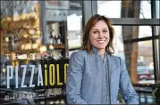  ?? HYOSUB SHIN PHOTOS / HSHIN@AJC.COM ?? Allison Hill, CEO of The Local Pizzaiolo, says the chain has met little resistance from customers over its decision to ban cash. In one case, she jumped in to pay when an elderly woman only had cash.
