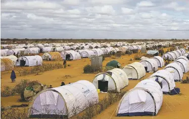  ??  ?? Kiosk rendering superimpos­ed on photograph of a refugee camp in Dadaab, Kenya, courtesy Curators Without Borders