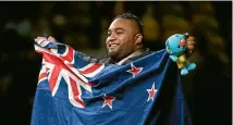  ?? PHOTOS: GETTY IMAGES ?? David Liti shows both his immense strength and his pride when winning, then celebratin­g, a gold medal on the Gold Coast.