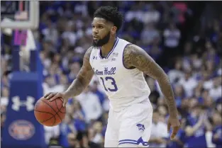  ?? JOHN MINCHILLO — THE ASSOCIATED PRESS FILE ?? Myles Powell, seen here during his senior year at Seton Hall, signed a two-way contract with the Sixers.